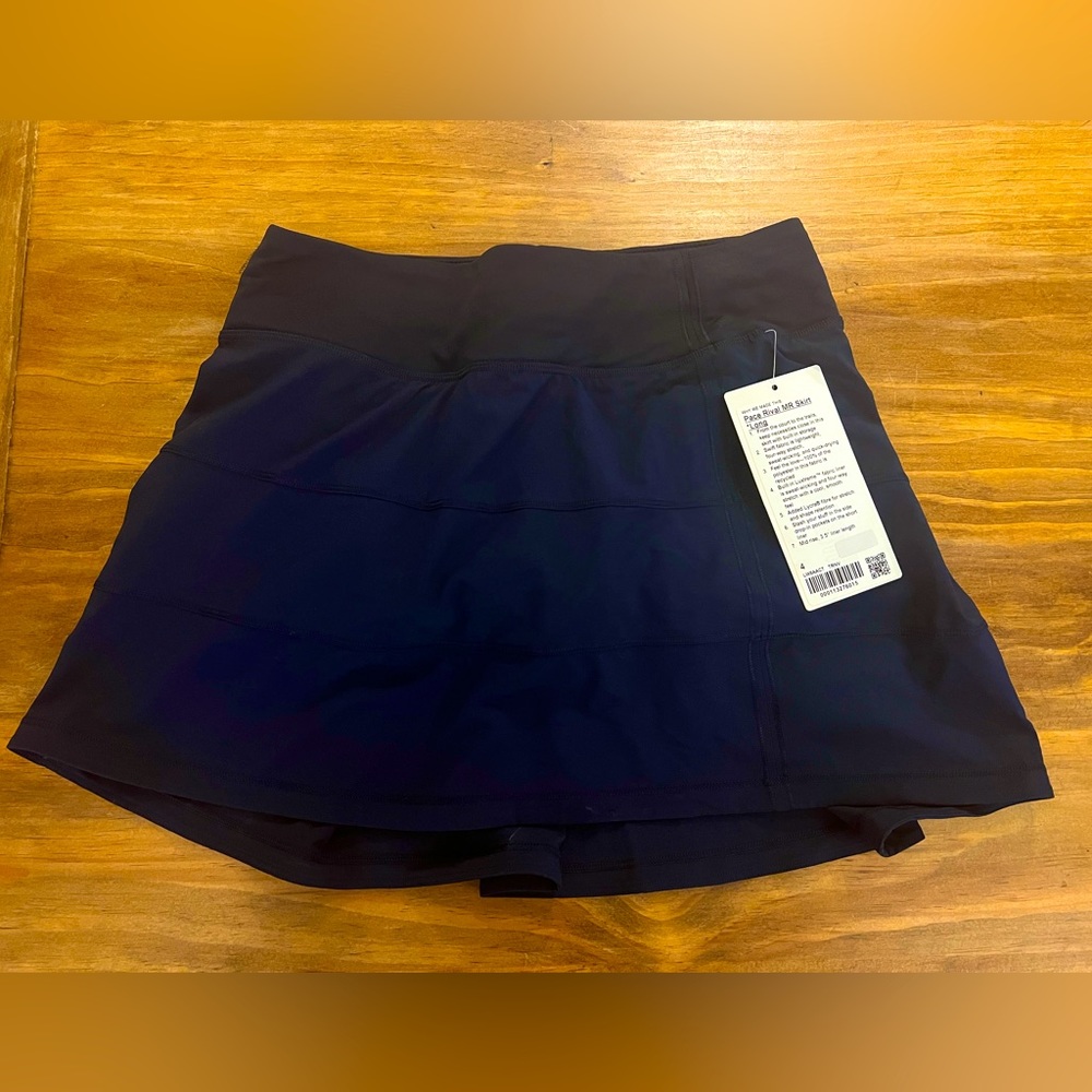 Dark blue. Lululemon skirt. Brand new w/tags. Size 4. Pace Rival MR Skirt.